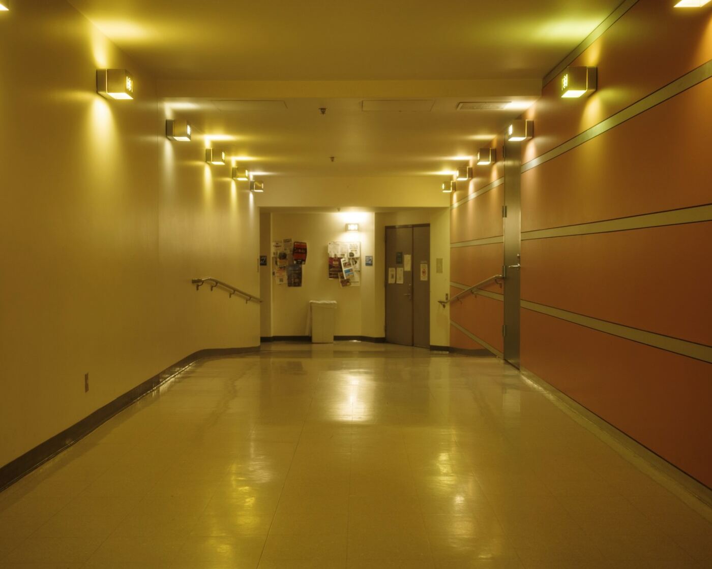 Quiet institutional hallway in a care facility