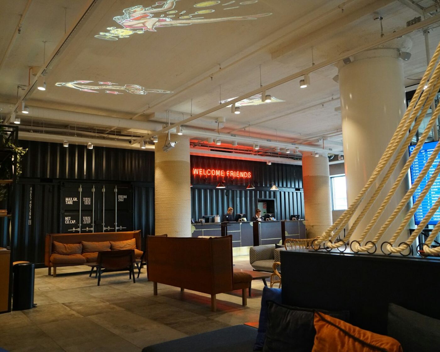 Modern hotel lobby reception and lounge seating