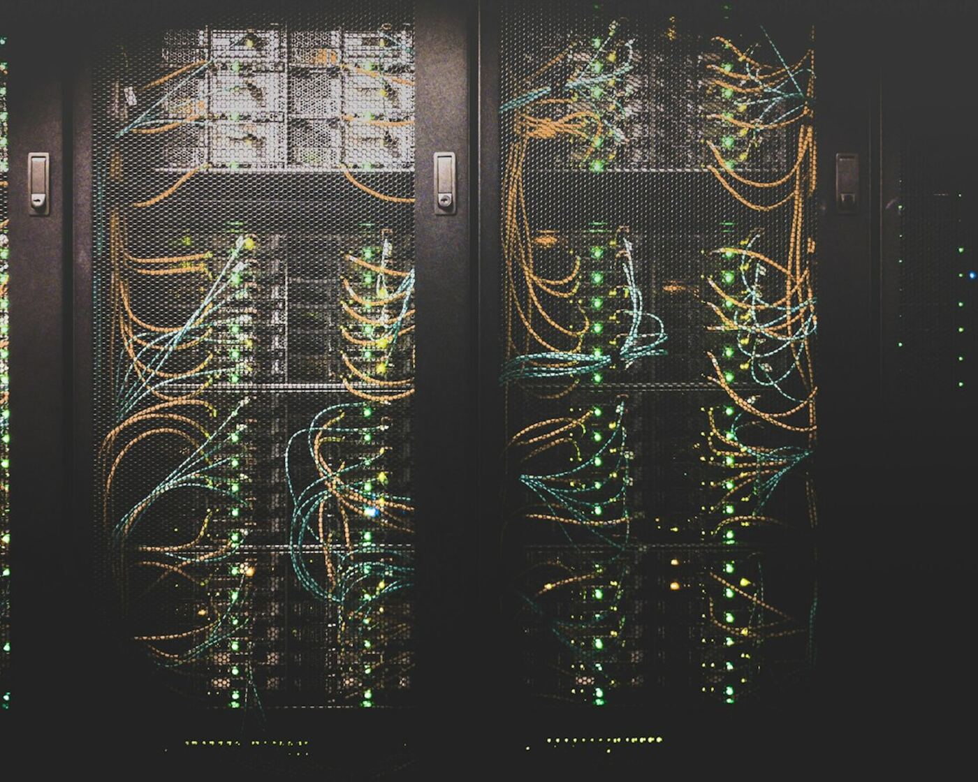 Server racks with network cabling in a data center