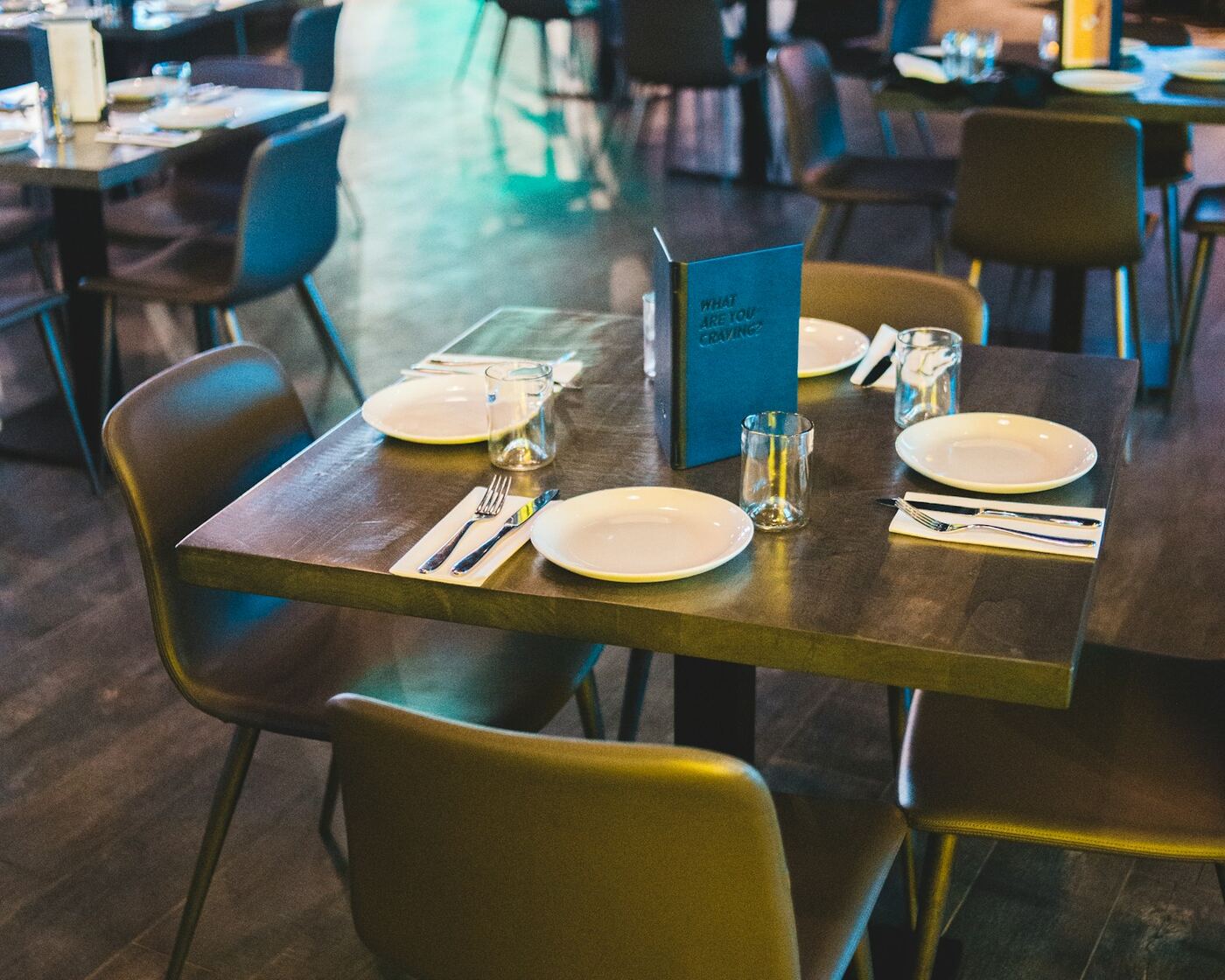 Empty restaurant dining table set before service